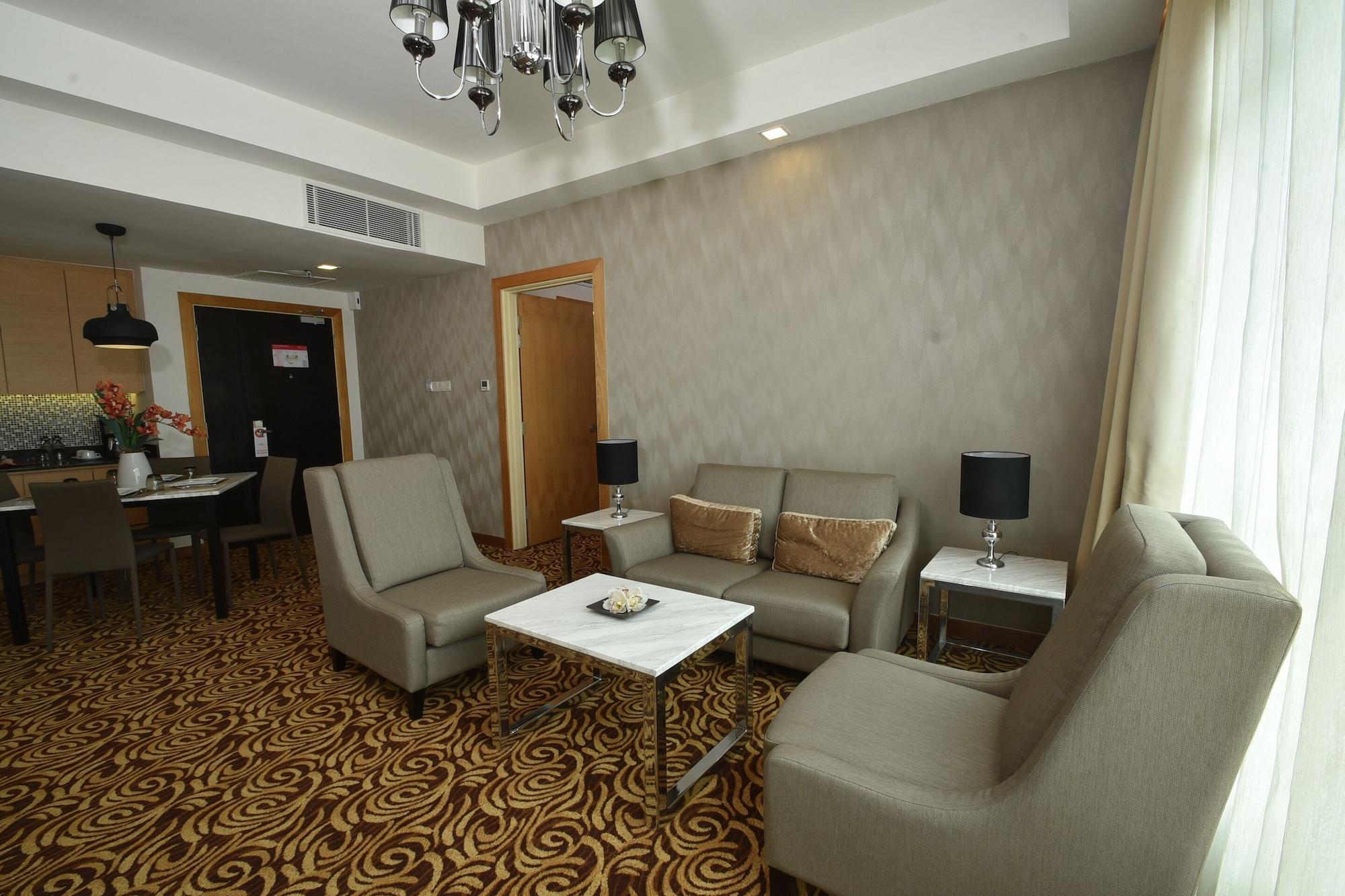 Tenera Hotel Bangi Zewnętrze zdjęcie A living room in a suite at the hotel